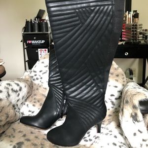 Wide calf thigh high boots